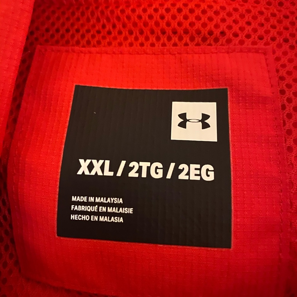 Red and white under amour wind breaker